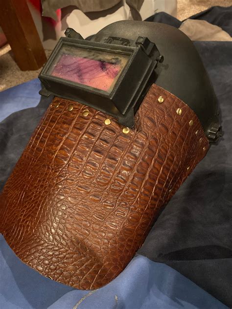 custom leather welding hoods.